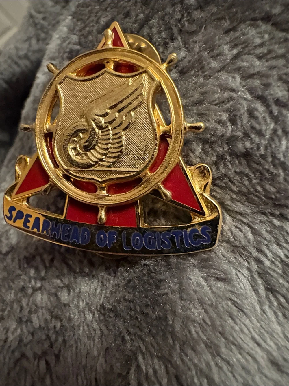 US Army Transportation Corps Spearhead of Logistics Gold & Red Enamel Lapel Pin
